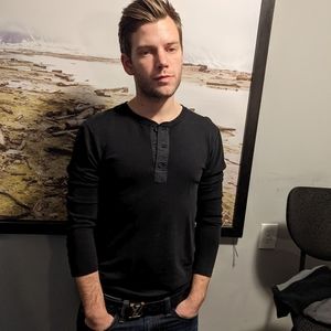 A beautiful crafted black J. Lindeberg Henley